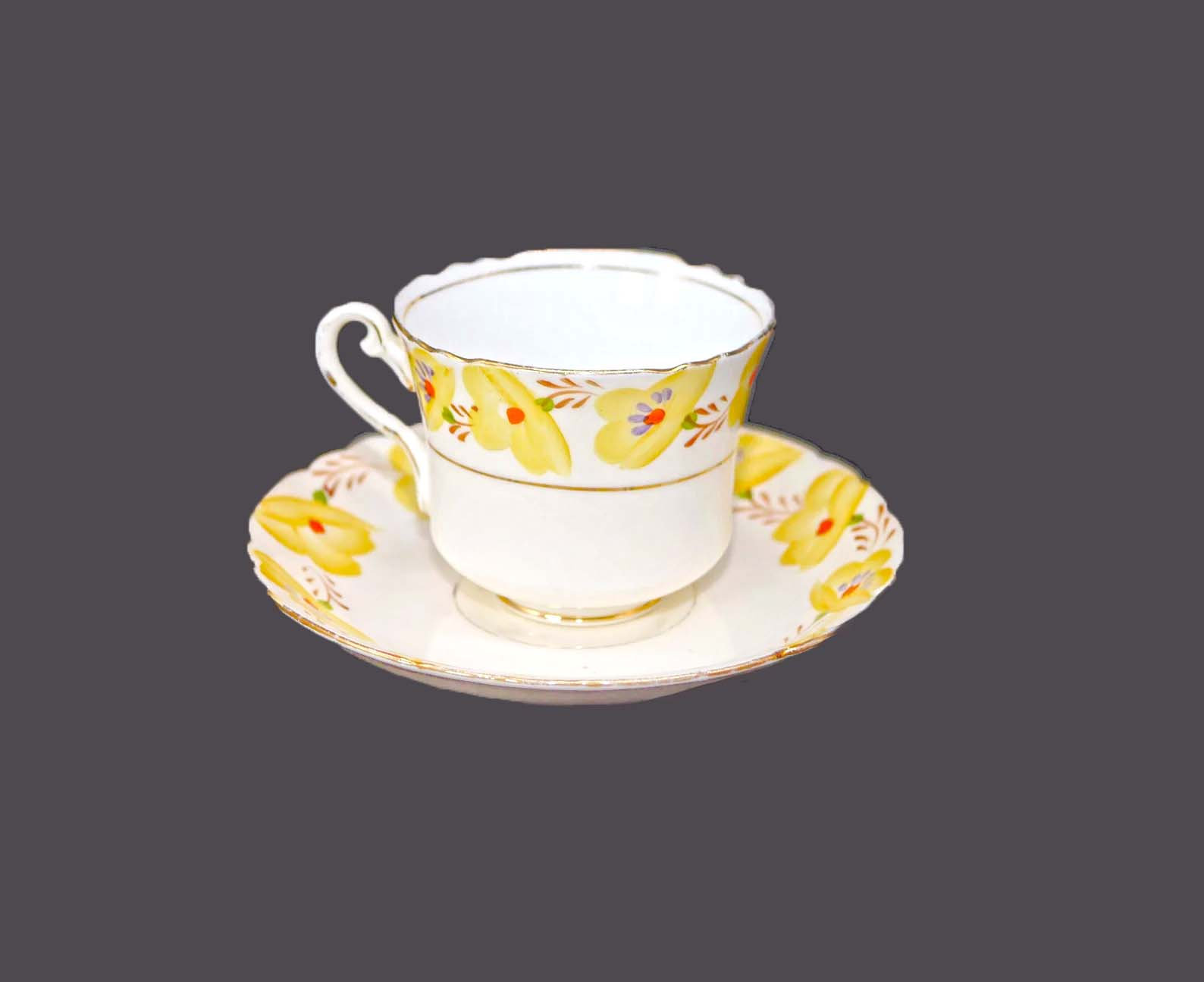 Yellow floral vintage porcelain teacup and saucer set