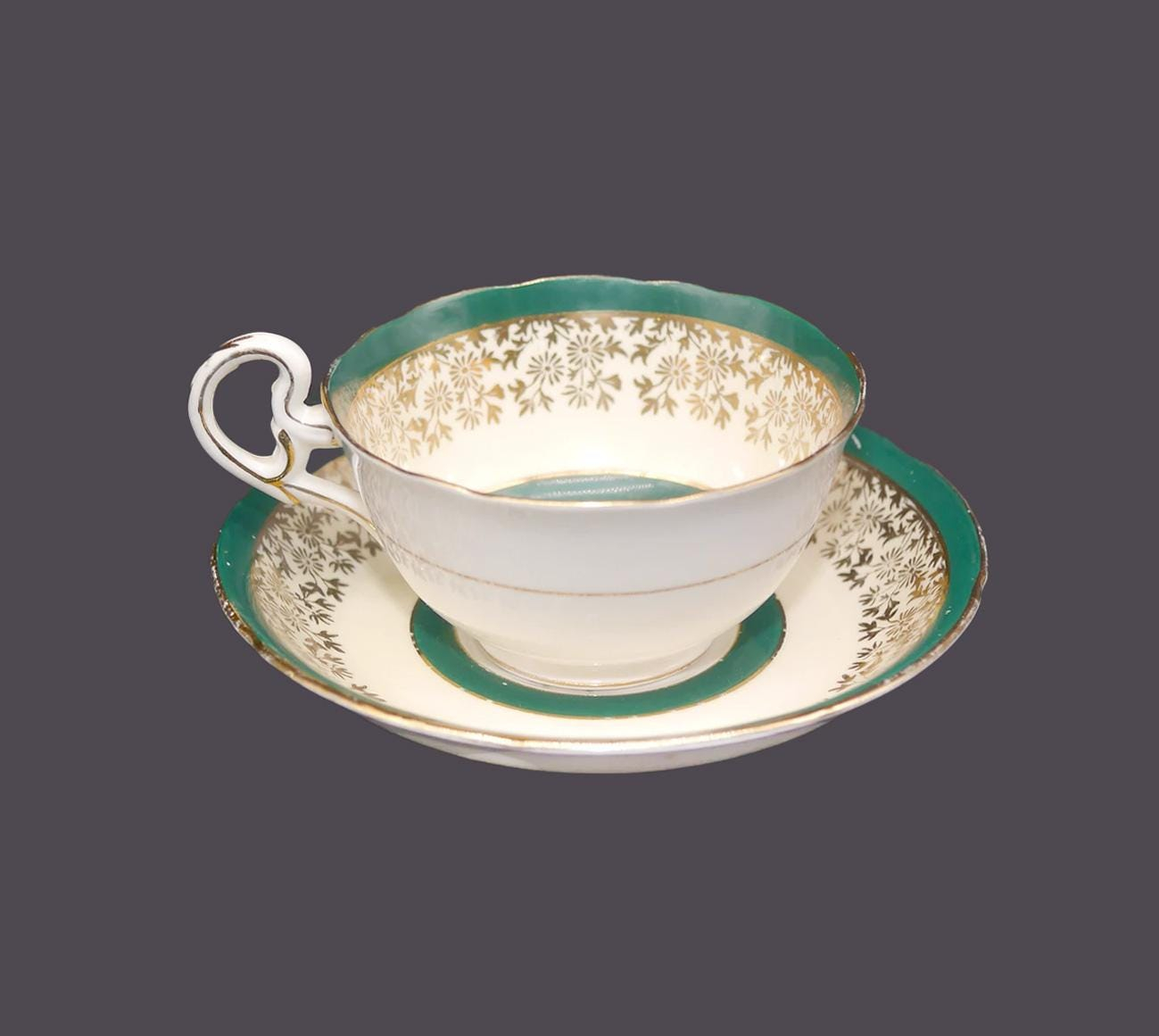Vintage porcelain teacup and saucer set